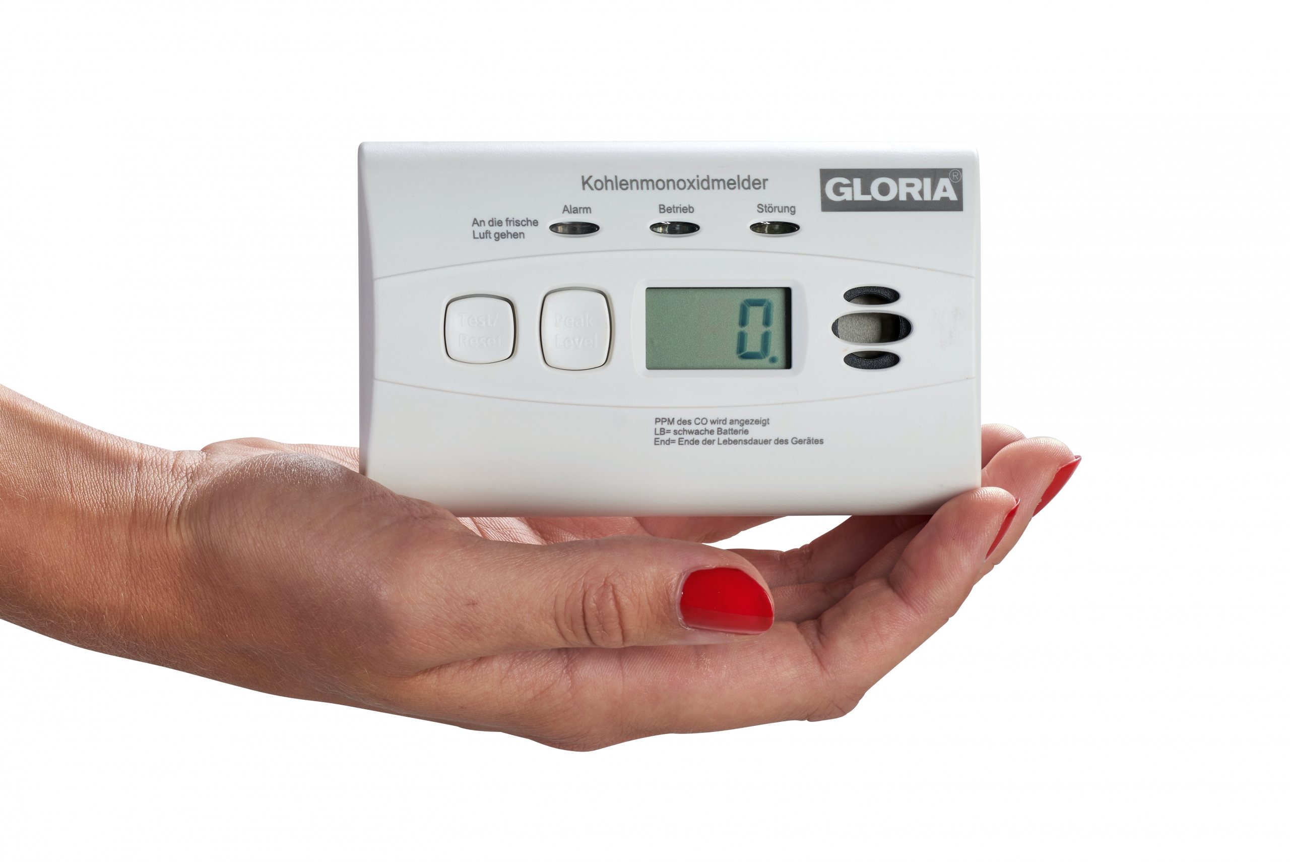Weißer Kohlendioxidmelder der Firma GLORIA, Model KO10D, gehalten in einer flachen Damenhand.